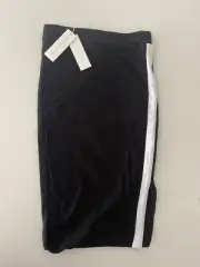 Decjuba Black Knee Length Tube Skirt with a White Side Stripe Detail and Split