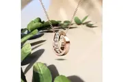 Rose Gold Interlock Ring Pendant Necklace Embellished With SWAROVSKI Crystals
