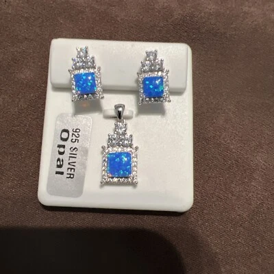 Classic Sterling Silver Opal Pendant With Matching Earrings