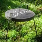 Outdoor 15' (40 cm) cast iron cooking pan on legs with pattern.