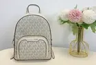 Michael Kors Jaycee Extra Small Zip Pocket Backpack Bag Light Cream MK Signature
