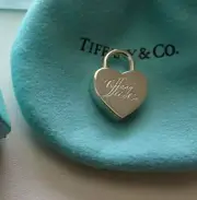 VINTAGE BUT NEW TIFFANY & CO WRITTEN IN SCRIPT STERLING SILVER HEART LOCK CHARM