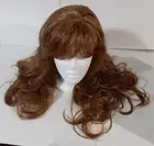 Custom petite synthetic wig made by Wigsis. Ginger color. Marie Osmond cut.