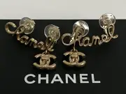 NIB Chanel CC Logo Cursive Signature Gold Tone Ear Crawler Cuff Clip Earrings