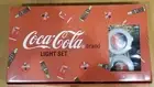 COCA COLA CHRISTMAS LIGHT SET BOTTLES AND ROUND SANTA NEW