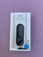 SimpliSafe Door Locked Home protected. Smart lock