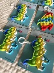 LOT OF 8 KIDS BACKPACK CLIPS POP FIDGET SENSORY TOYS NWT