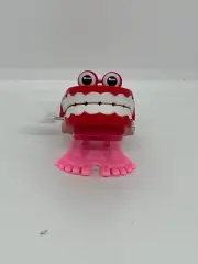 Wind-Up Chattering Teeth - Novelty Fun Gag Gift- Mini Chatter Teeth With Eyes