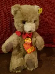 Vintage STEIFF sitting teddy bear tan 0205/26 with ear button & tag 11"