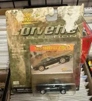 Johnny Lightning 1965 Corvette Coupe Diecast Car (PKG WR)