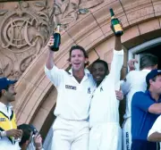 Warwickshire captain Dermot Reeve Brian Lara celebrate with champa- Old Photo