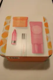 CLINIQUE Happy Treats 4 Piece Set Gelato Hand & Body Creams, Perfume, Lip Balm.