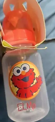 Rare Elmo Bottle. Sesame Street. Box Slightly Damaged As Seen In Photos