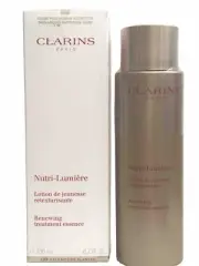 Clarins Face Lotion Nutri-Lumiere Renewing Essence 6.7 oz Anti-age