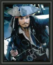 JOHNNY DEPP PIRATES OF THE CARRIBEAN SIGNED - AUTOGRAPHED PHOTO POSTER