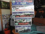 lot of 5 hess truck space shuttle helicopter jet race car front loader