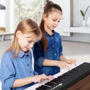 Costway61-Key Folding Piano Keyboard with Full Size Keys & Music Stand