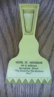 vintage yellow Ice scraper St. Nicholas hotel Springfield, Ill. 4th & Jefferson