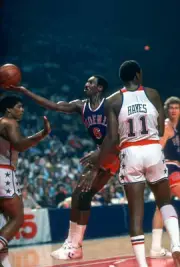 Walter Davis Phoenix Suns goes in for a layup between Elvin Hayes - Old Photo