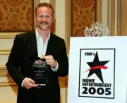 Filmmaker Morgan Spurlock poses backstage after receiving the awar - Old Photo