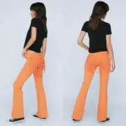 Nasty Gal Women's Denim Low Rise Fringe Flare Pants in Orange Size 8 NWT