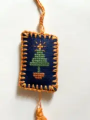 completed cross stitch scissor fob ornament Christmas tree crochet border tassel