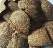 COCONUT SHELL CHIPS WITH SMOOTH OUTSIDE AND INSIDE . 400g PACKET.