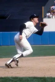 Graig Nettles New York Yankees tracks a pop up on the infield at - 1976 Photo