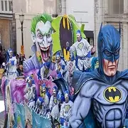 Batman & Joker Mardi Gras Float Mardi Gras began in Mobile Alabama in 1703 when it was a colony of French soldiers Colorful beads and Moon Pies (two large cookies with marshmallow in between and cover