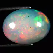 4.24 ct Remarkable Oval Cabochon (14 x 11 mm) Ethiopian Flashing Rainbow Opal