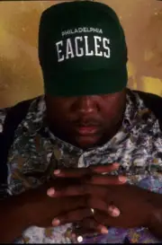 Rapper Chubb Rock is shown wearing a Starter brand Philadelphia Ea- Old Photo 11