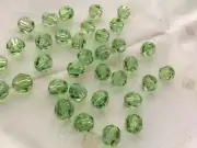 (12) Swarovski® Crystals - 6mm Peridot