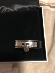 Ladies brand new Oroton bangle with locket