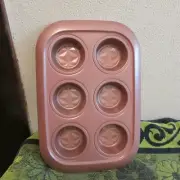New. Beautiful Elle Non-Stick, Rose Colored Cupcake/ Muffin Pan.