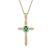 Oval Emerald and 0.05 CT. T.W. Natural Diamond Frame Layered Cross Pendant in 10K Yellow Gold