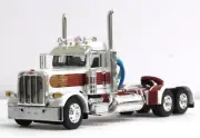 DCP white w/red stripe Peterbilt 389 daycab tractor new no box 1/64