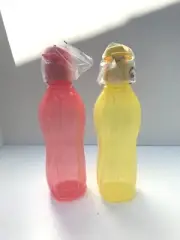 New Tupperware set of 2 16 oz water bottles with flip top caps