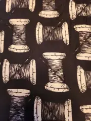 Knit Fabric Thread/Spool Print Black Background Two Yards