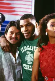 Heavyweight fighter Mike Tyson, center, and wife Robin Givens, Boxing 1988 Photo