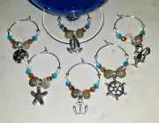 NAUTICAL Wine Glass Charms Set of 6 NEW ANCHOR SHIP WHEEL STARFISH SAND DOLLAR