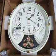 Rhythm Musical Motion Wall Clock New Brown Faux Wood Grain Quartz Japan Decor