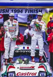 Didier Auriol and Bernard Occelli celebrate second place WRC Rally Car Photo