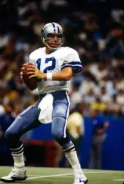 Quarterback Roger Staubach of Dallas Cowboys drops back to pass at- Old Photo