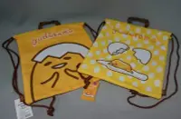 在飛比找Yahoo!奇摩拍賣優惠-蛋黃哥 gudetama 可掛式 束口後背包 雙肩包 輕便包