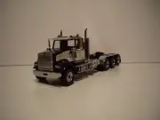 DIECAST MASTER 1/50 BLACK AND WHITE TRI-AXLE WESTERN STAR 4900 SF FIRST GEAR