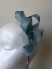 NEW light blue loop fascinator on a metal headband. Stunning on!