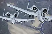March 16, 2010 - Two A-10C Thunderbolt II Aircraft Fly in Formation During a Training Exercise at Moody Air Force Base, Georgia. Poster Print (34 x 22)