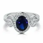 Lab Created Halo With Oval Cut Blue & White Gemstone Women's Solitaire Ring