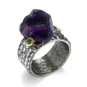 Large uncut amethyst stone in sterling silver ring