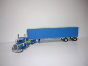 DCP FIRST GEAR 1/64 BLUE PETE 379 WITH SLEEPER AND SIMULATED ROLL TARP TRAILER